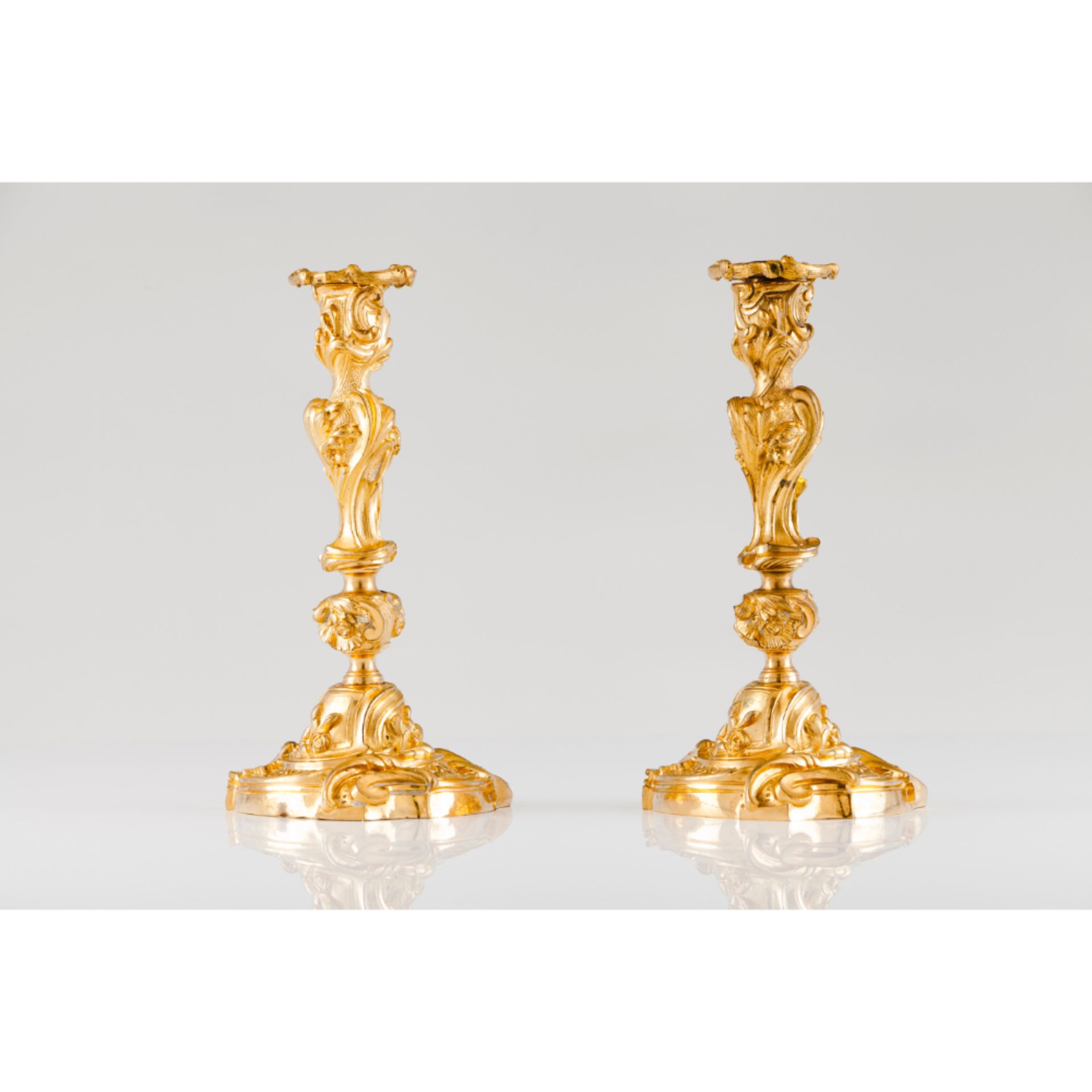 A pair of Louis XV candlesticks