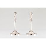 A pair of Consulate candlesticks