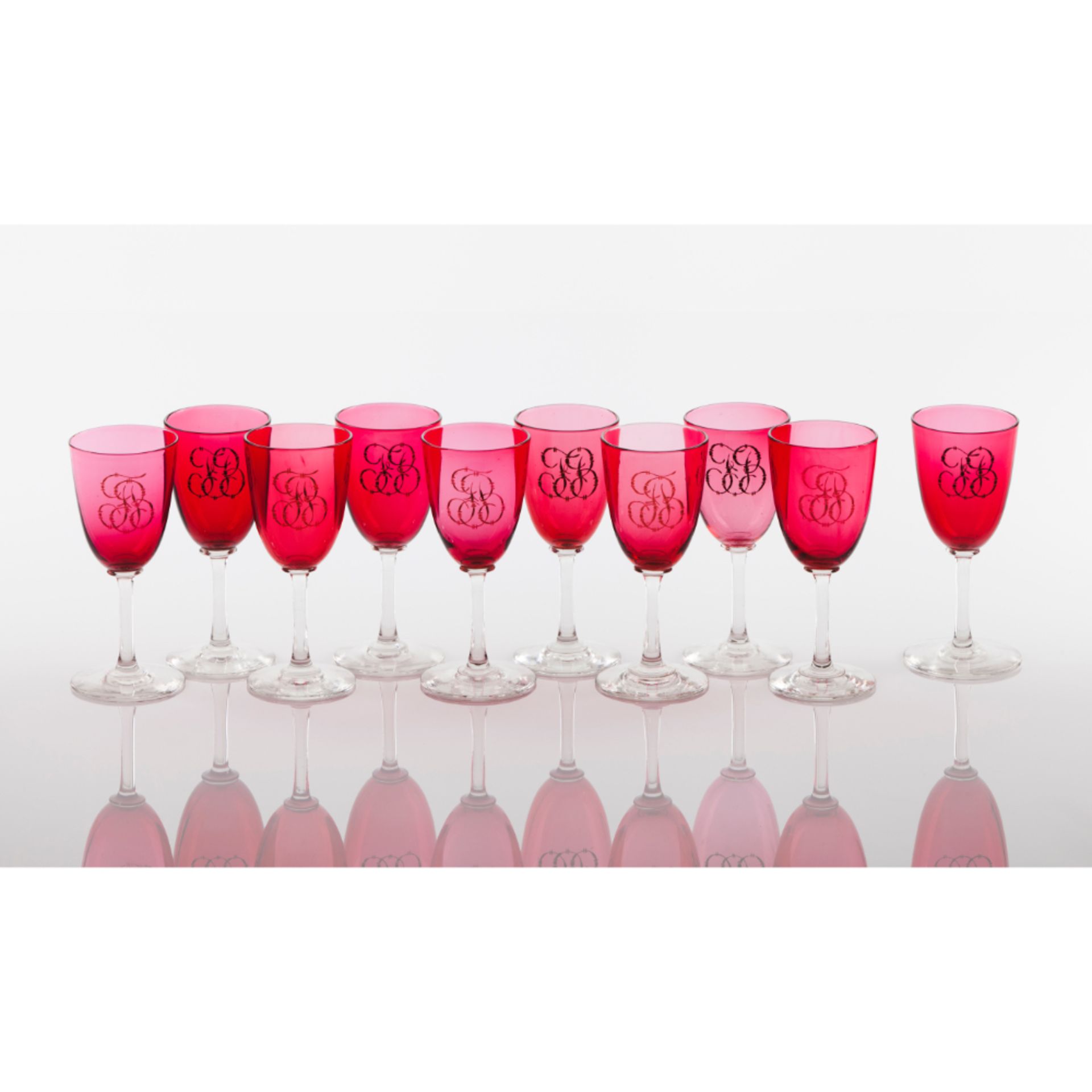 A set of 10 pink drinking glasses