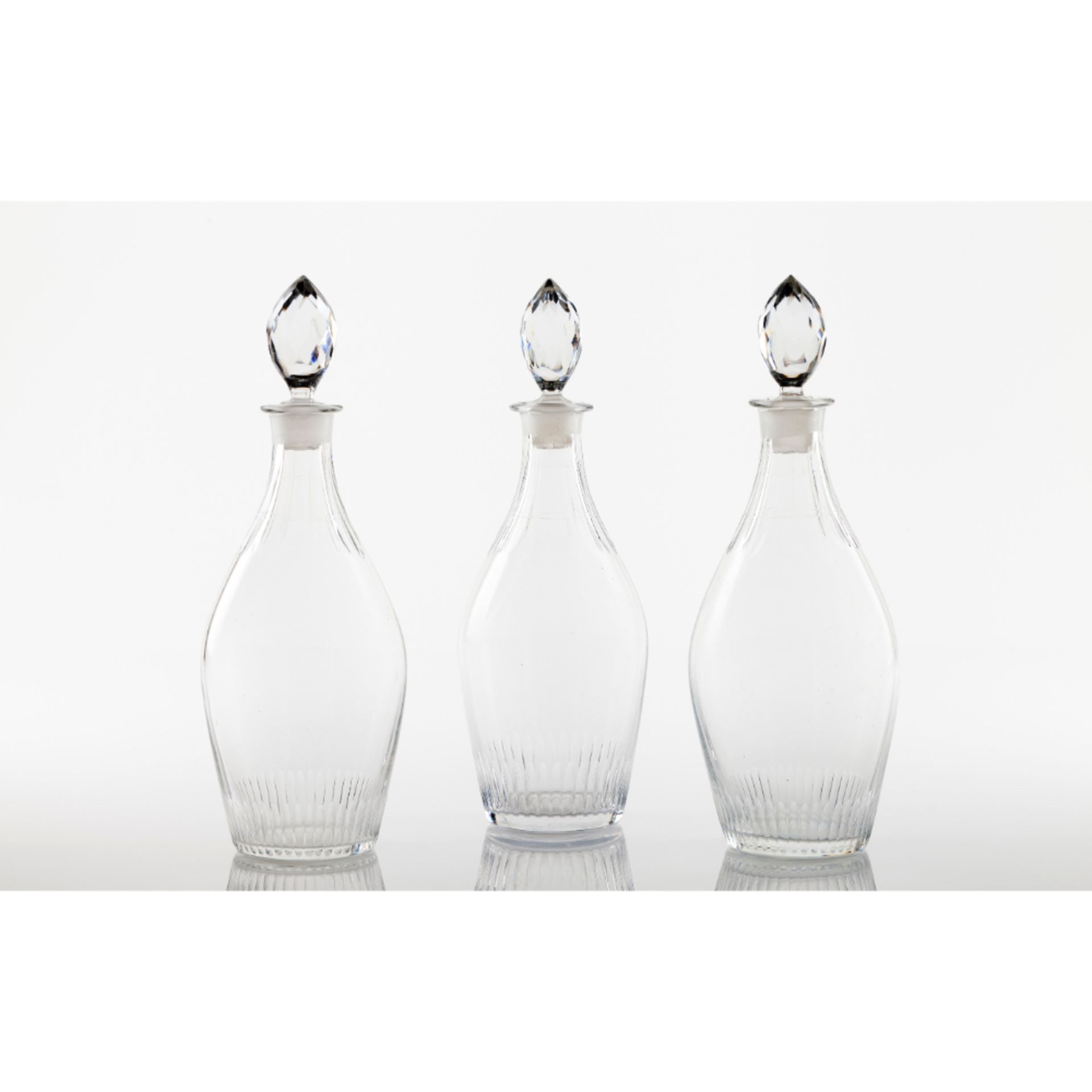 A set of 3 Louis XVIII decanters