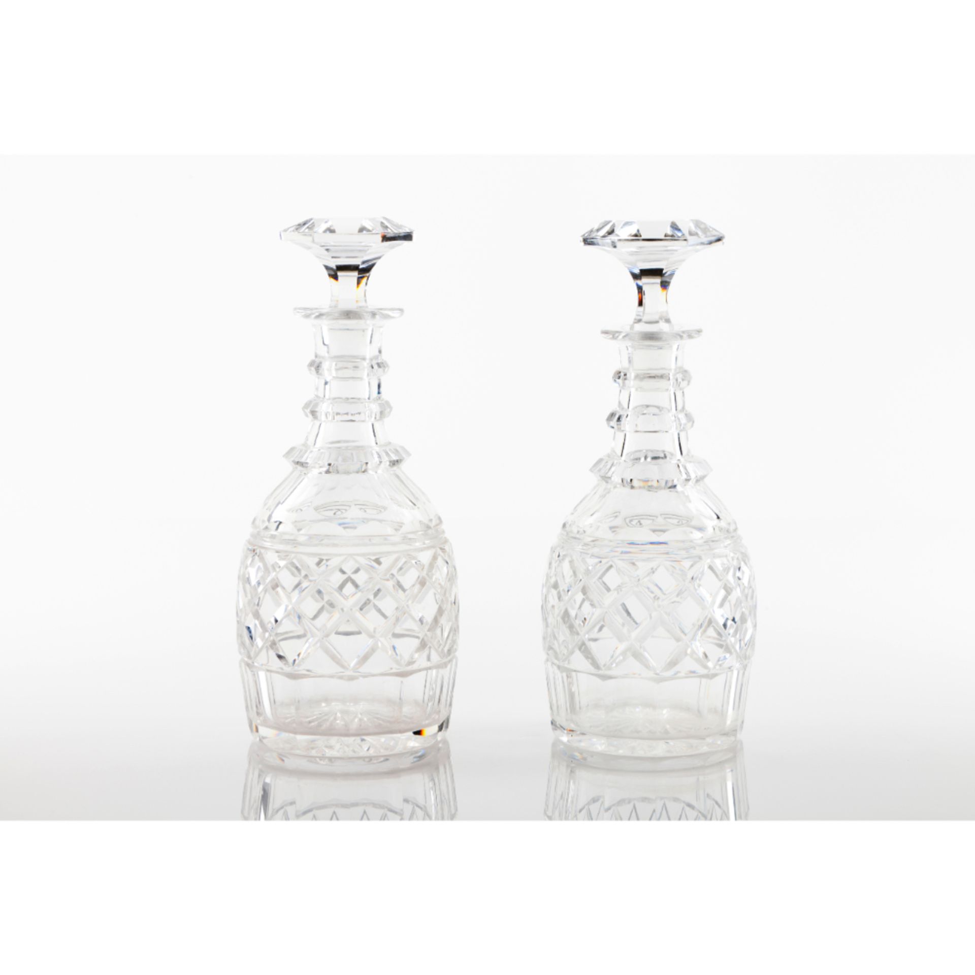 A pair of Louis XVIII decanters