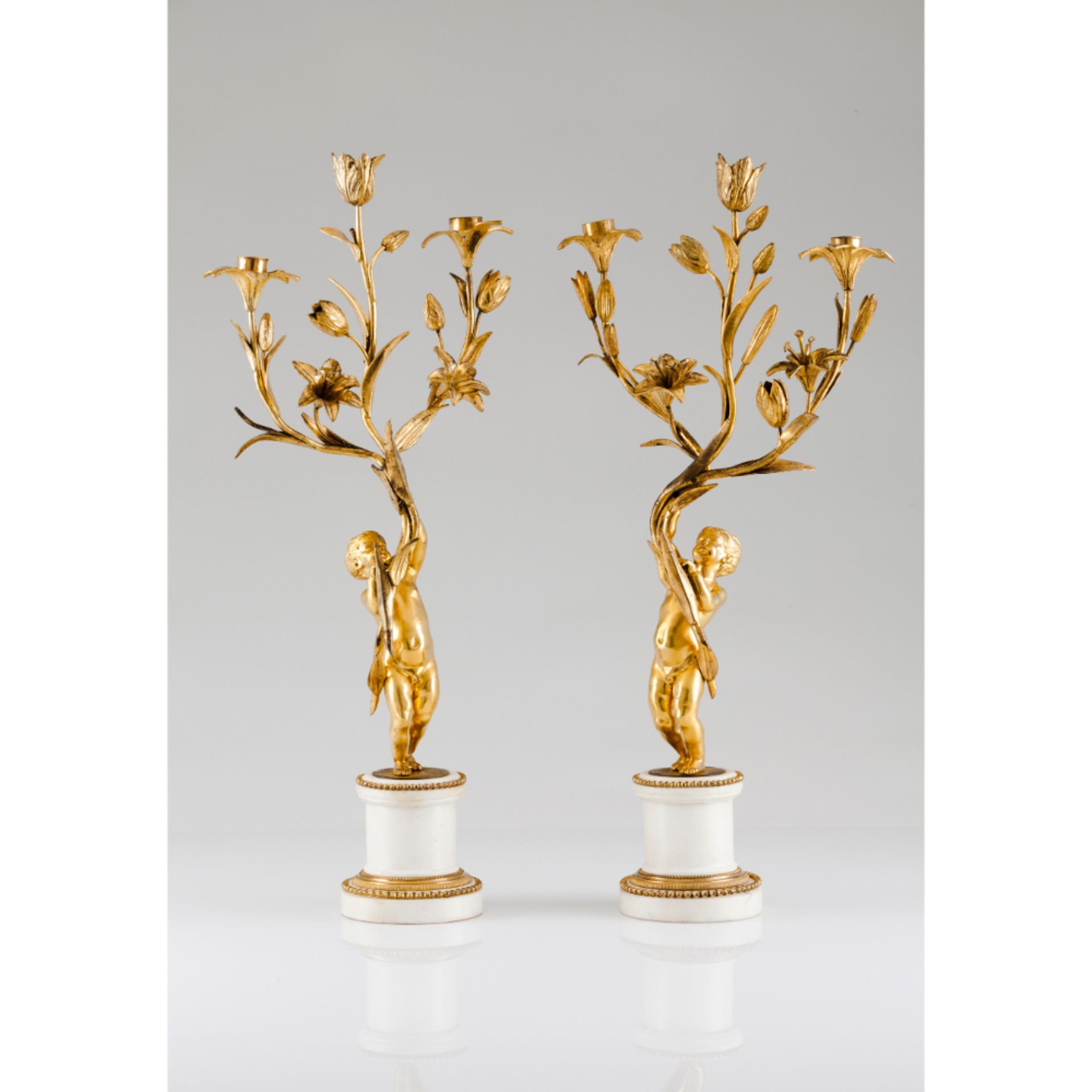 A pair of A Louis XVI "angels" candelabra