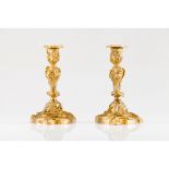 A pair of Rococo Louis XV period candlesticks