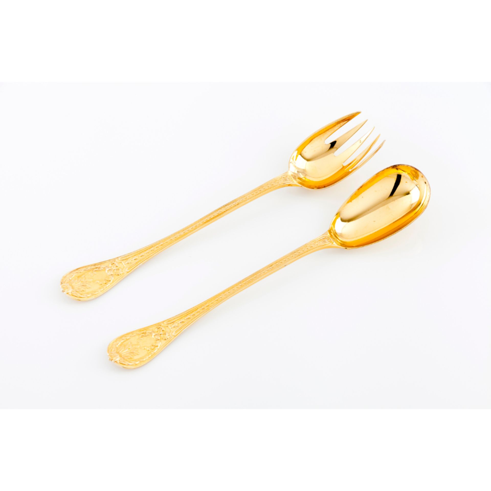 A Louis XVI style salad servers