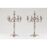 A pair of Louis XVI style five branch candelabra