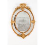 A Louis XVI style wall mirror