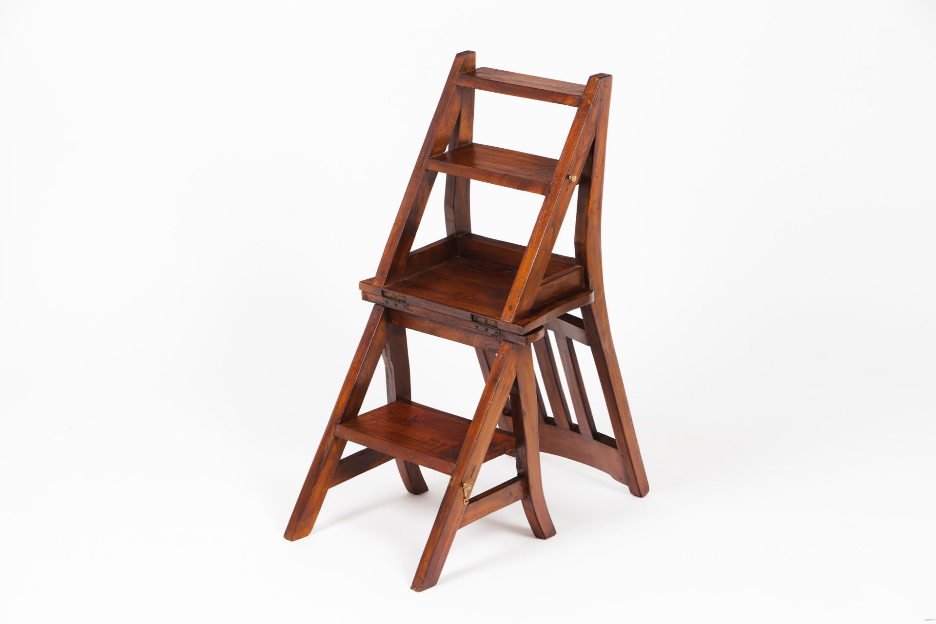 A metamorphic library chair / step ladder