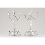 A pair of four branch candelabra