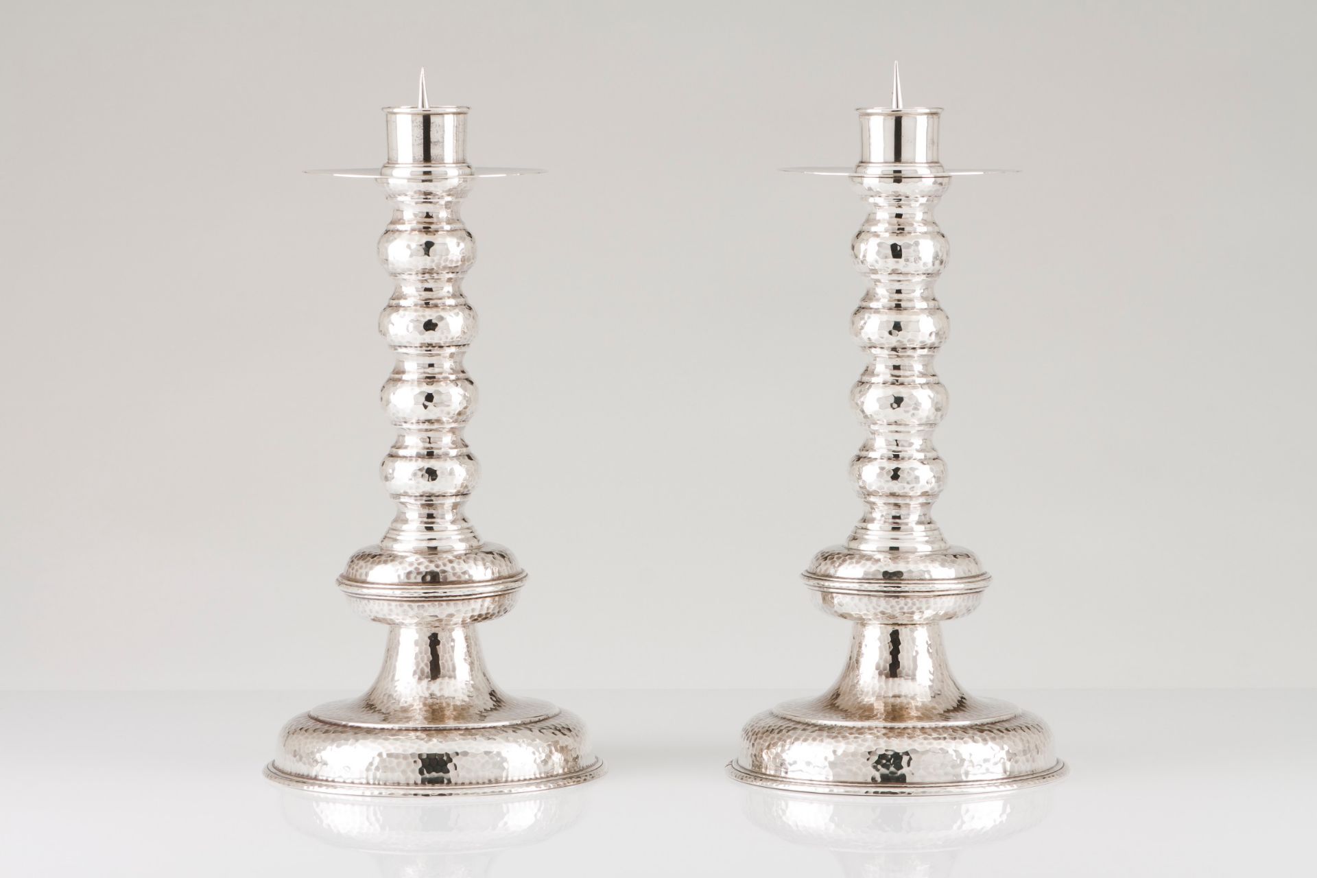 A pair of large candle holders