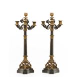 A pair of four branch Empire style candelabra
