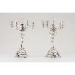 A pair of five branch candelabra