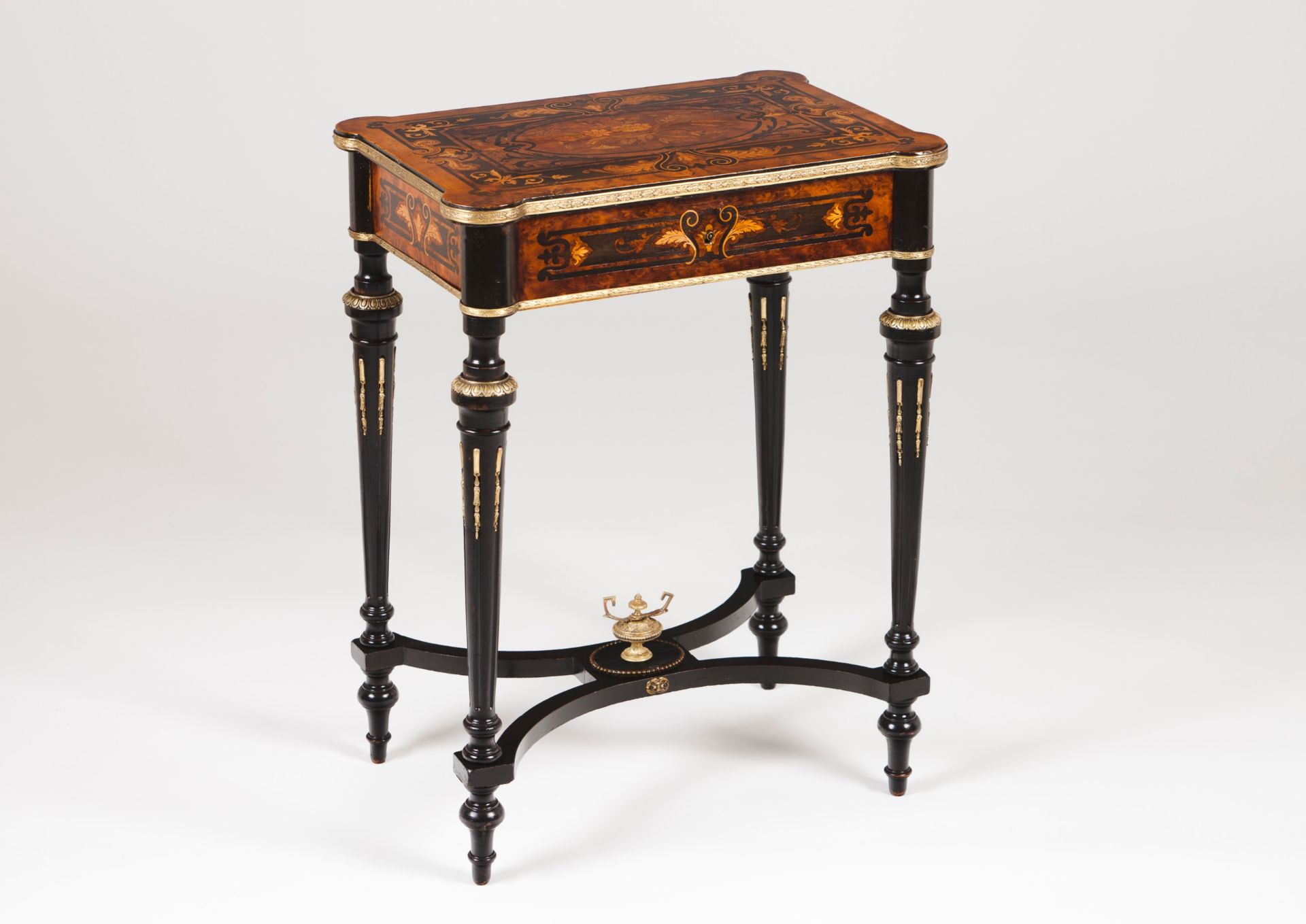 A Napoleon III sewing table