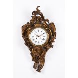 A Louis XV style wall clock