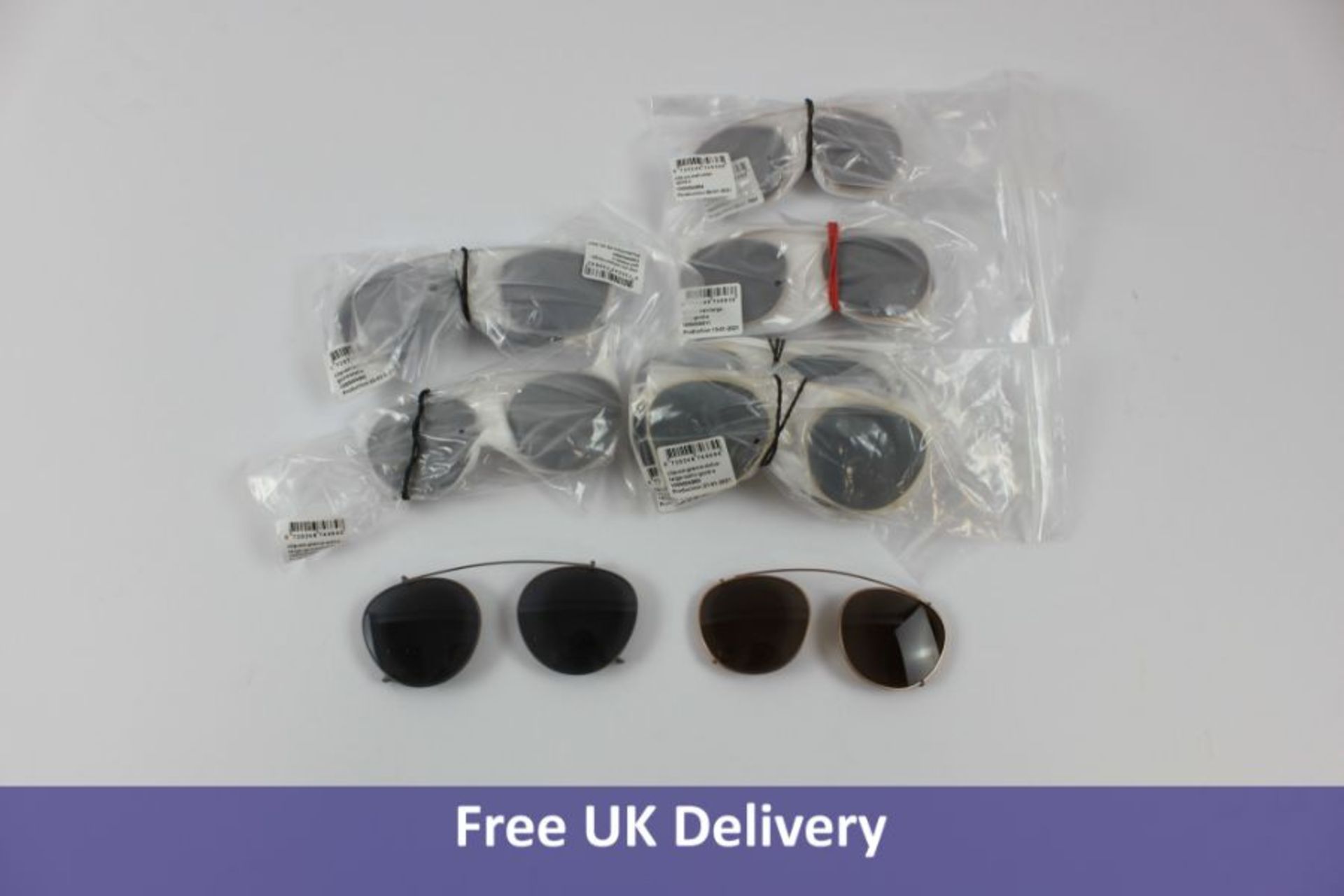 Twelve pairs of Ace & Tate Sunglasses Clip-ons