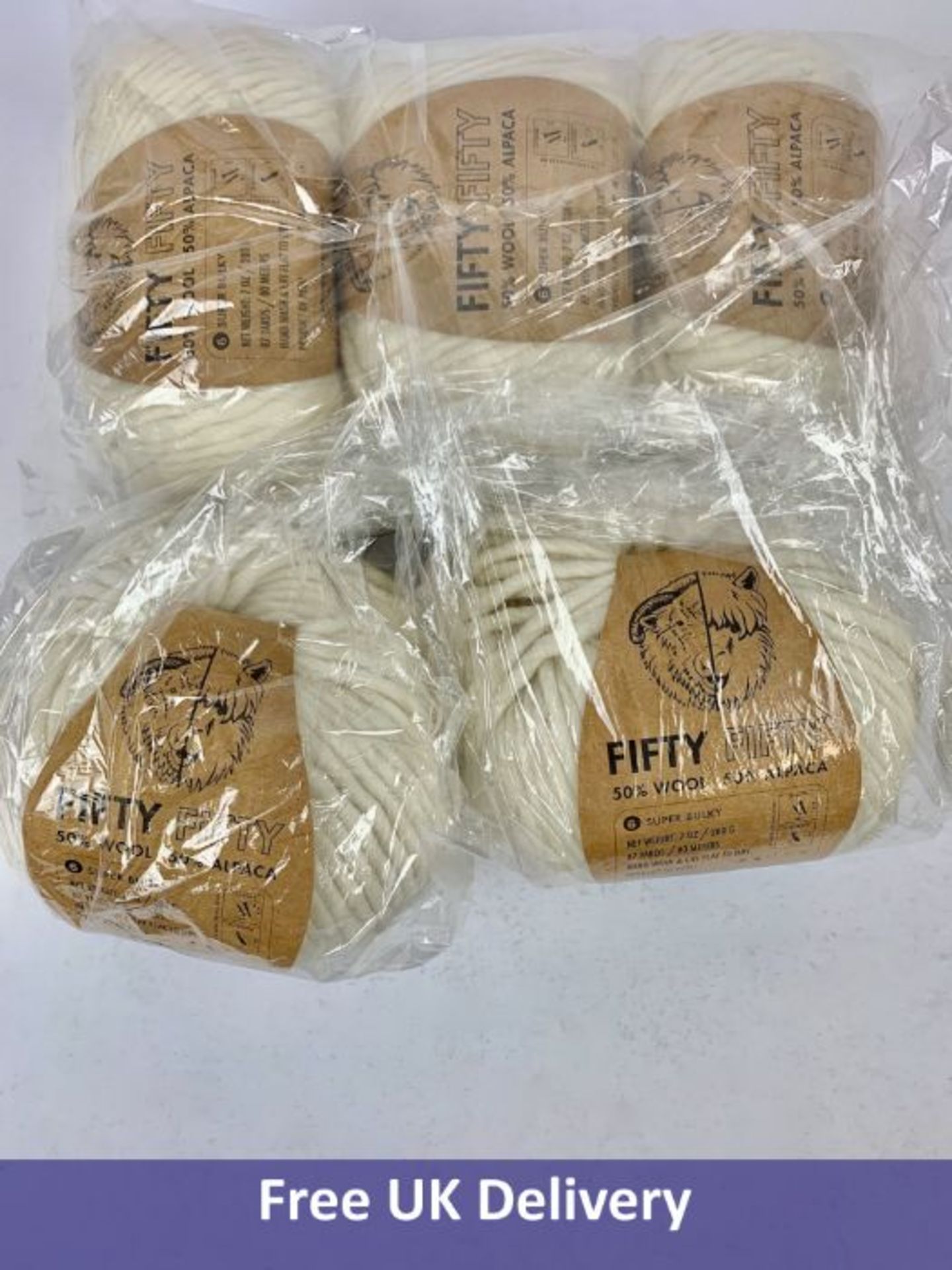 Five balls of Lion Brand 50/50 Wool, Ecru