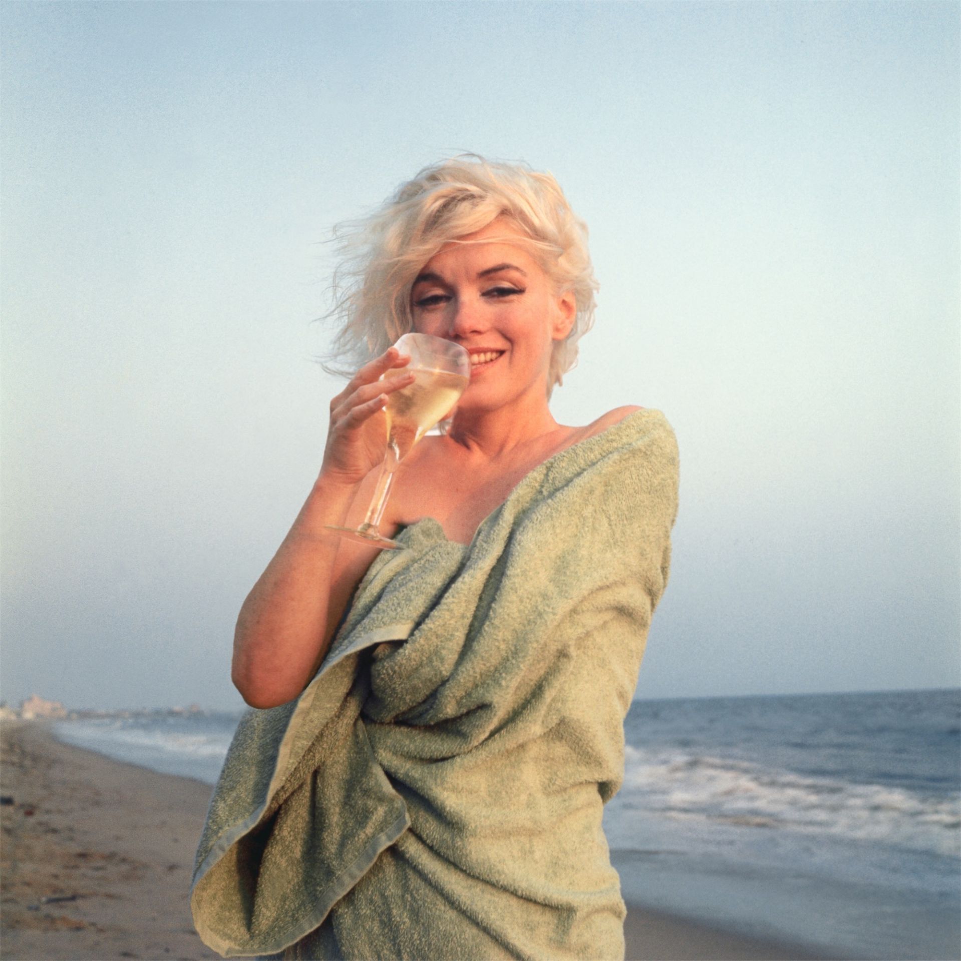 George Barris. Marilyn Monroe Champagne Sipping on the Beach, Santa Monica Beach. 1962