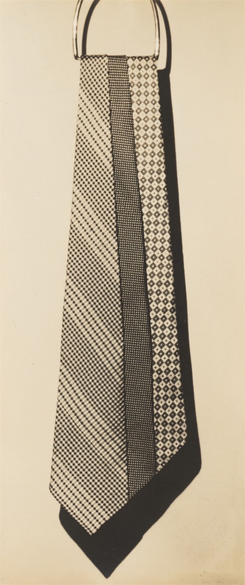 Paul Outerbridge Jr.. Untitled (Ties Hanging from Ring). Um 1924/26