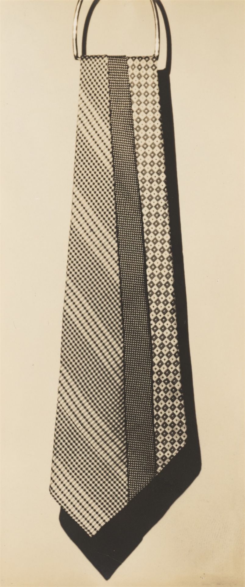 Paul Outerbridge Jr.. Untitled (Ties Hanging from Ring). Circa 1924/26