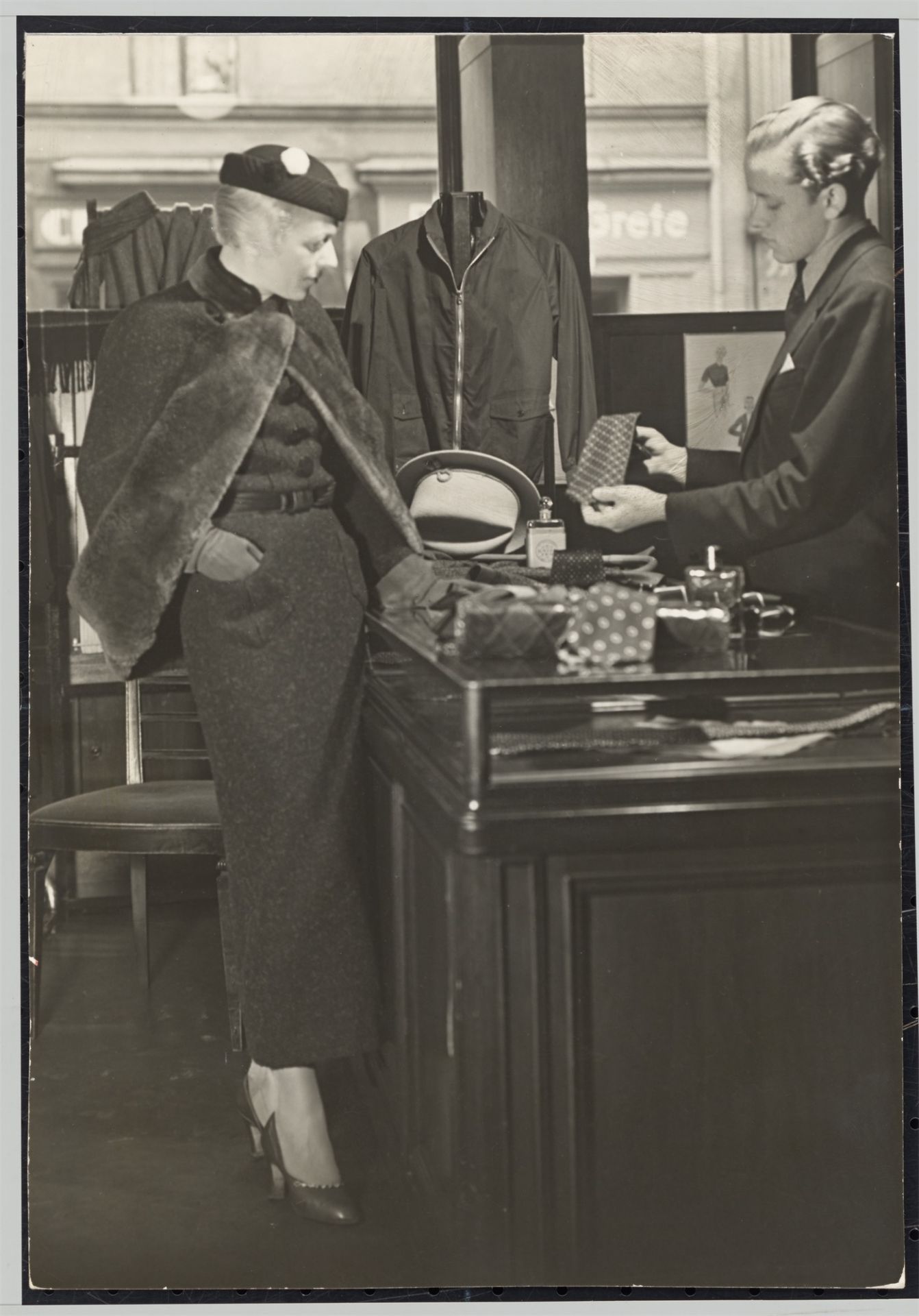 Ewald Hoinkis. Lady at the Gentleman's Outfitter. Circa 1934 - Image 2 of 4