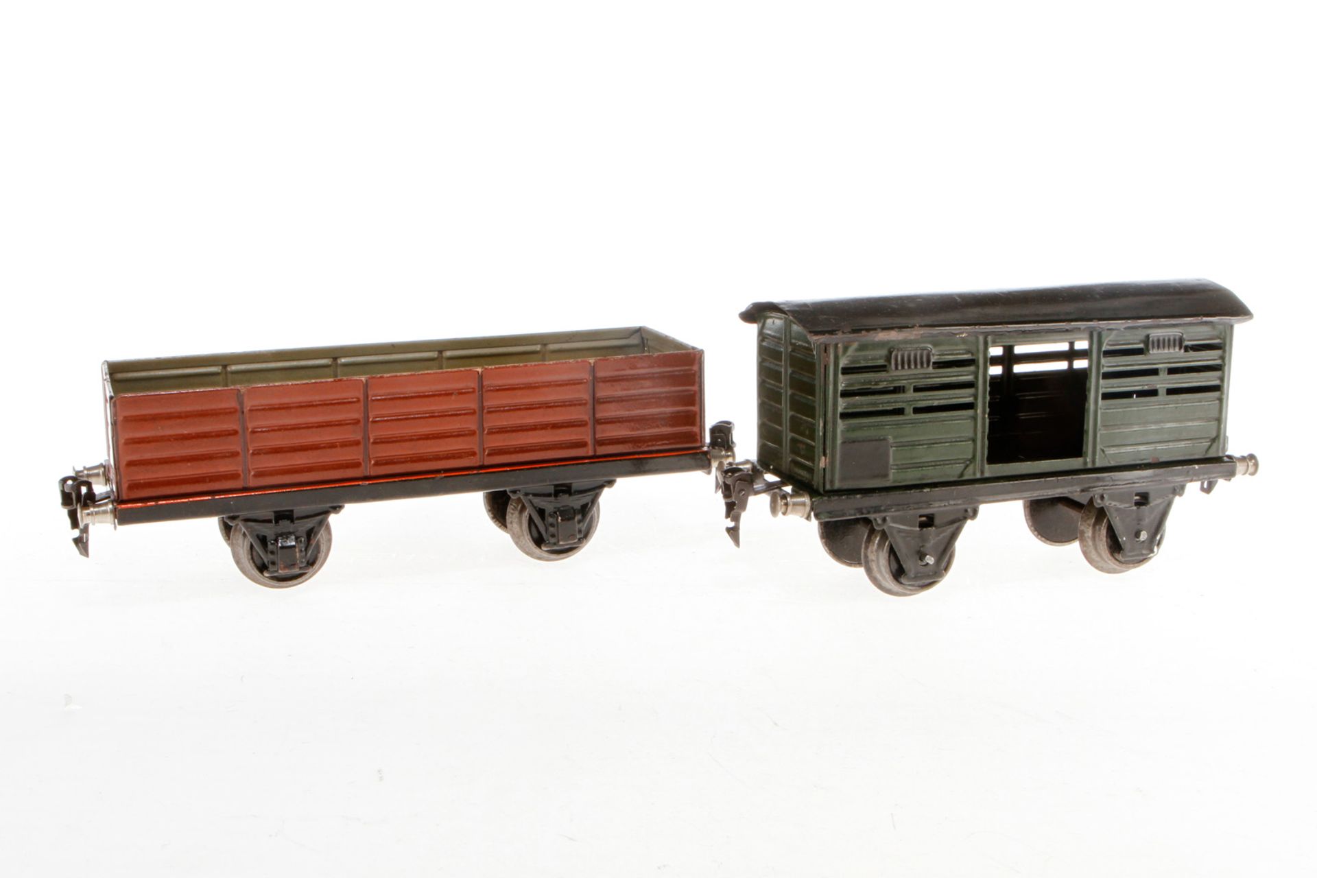 2 Märklin Güterwagen, S 1, handlackiert, Lackschäden teilweise ausgebessert, L 19,5 und 24, Z 3