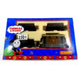 Hornby R9089 Thomas the Tank set, Toby the Train with three trucks. P&P Group 1 (£14+VAT for the