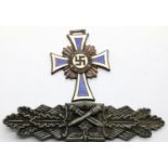 German WWII type Close Combat clasp lacking pin and a Third Reich type Mothers Cross in bronze. P&