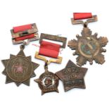 Four Chinese WWII type medals. P&P Group 1 (£14+VAT for the first lot and £1+VAT for subsequent