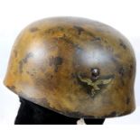 German WWII type Paratrooper helmet, original shell, the rest re finished in a desert camo with