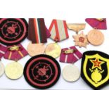 Soviet Russian medals, badges and patches. P&P Group 1 (£14+VAT for the first lot and £1+VAT for