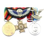 Collection of Rhodesian medals and cloth Paratroopers wings. P&P Group 1 (£14+VAT for the first