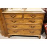 George III mahogany chest of two short over three long graduated drawers, raised on bracket feet,