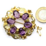 Victorian gilt metal amethyst type brooch, D: 4 cm. P&P Group 1 (£14+VAT for the first lot and £1+