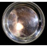 Small silver circular tray, 35g. P&P Group 1 (£14+VAT for the first lot and £1+VAT for subsequent