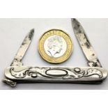 Continental Art Nouveau silver twin bladed penknife. P&P Group 1 (£14+VAT for the first lot and £1+