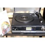 Maginon turntable with built in speakers, USB, MP3 and cassette, allows records to be converted