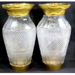 Pair of large French heavy cut glass baluster vases, with gilt rims and bases, one small chip to one