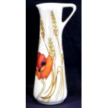 Moorcroft jug in the Harvest Poppy pattern, H: 18.5 cm. P&P Group 2 (£18+VAT for the first lot
