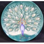 Boxed limited edition Moorcroft Peacocks year plate, 1/500, D: 22 cm. P&P group 2 (£18+ VAT for