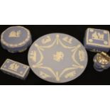 Wedgwood blue Jasperware plate, table lighter and three lidded boxes. P&P Group 3 (£25+VAT for the