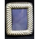 Small hallmarked silver photograph frame, H: 8 cm. P&P Group 1 (£14+VAT for the first lot and £1+VAT