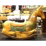 A rocking horse, carved from a single piece of hardwood. Not available for in-house P&P