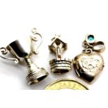 Three assorted vintage white metal charms. P&P Group 1 (£14+VAT for the first lot and £1+VAT for