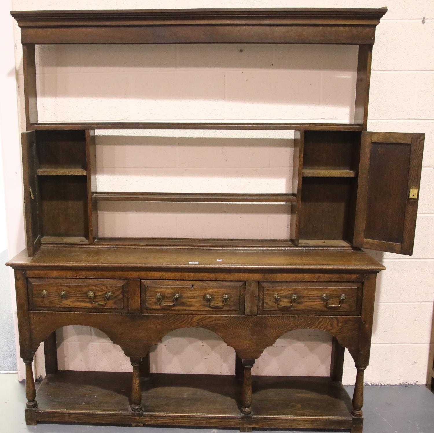 Oak three drawer dresser with cupboards and plate rack above, possibly Victorian, 160 x 39 x 185 cm.