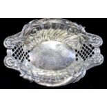 Hallmarked silver pierced ornate oval dish, 36g. P&P Group 1 (£14+VAT for the first lot and £1+VAT