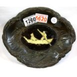 Bronze Oriental scalloped dish with bone centre of couple in a boat, W: 21 cm. P&P Group 2 (£18+