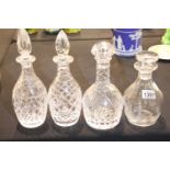 Four mixed crystal decanters with stoppers. P&P Group 3 (£25+VAT for the first lot and £5+VAT for