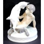 Royal Copenhagen faun with goat. P&P Group 2 (£18+VAT for the first lot and £3+VAT for subsequent
