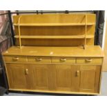 Light wood Ercol dresser with two shelf back, four drawers and two under cupboard with concertina