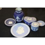 Six pieces of Wedgwood blue Jasperware: vase, round lidded box, heart shaped lidded bo and three