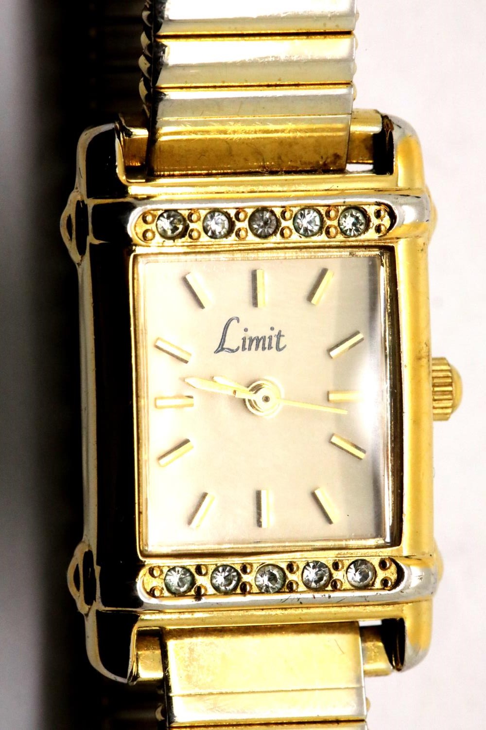 Ladies Limit gold plated stainless steel rectangular wristwatch on expandable bracelet with new